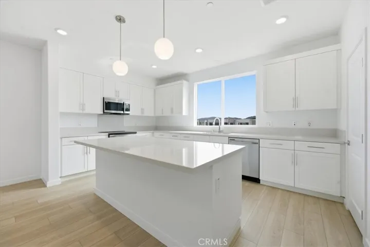 Large Kitchen with Oversized window over sink