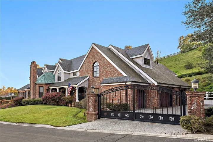 Front Exterior with Private Gated Driveway