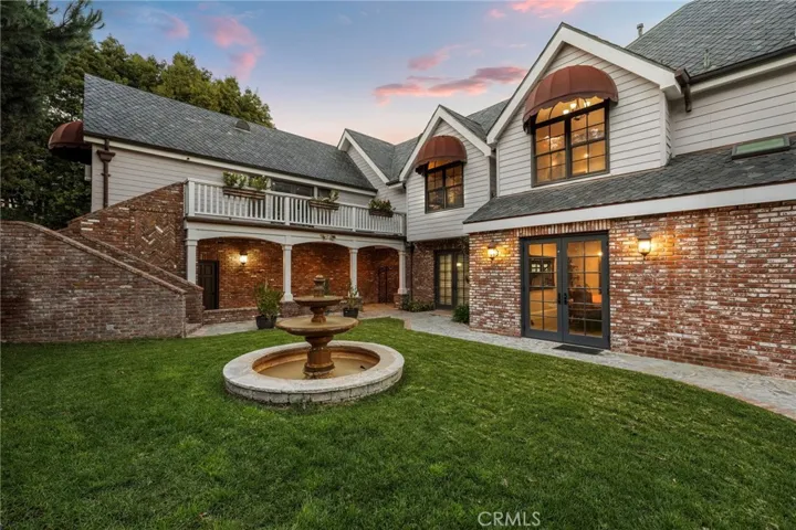 Backyard Fountain with Doors Leading to Dining Room