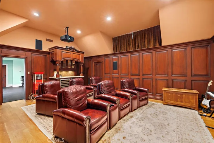 Movie Theater with Built-in Mini Fridge and Wine Fridge plus Exercise Room plus Craft Room