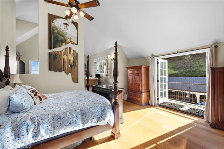 Primary Bedroom with Two Balconies plus Spiral Staircase.