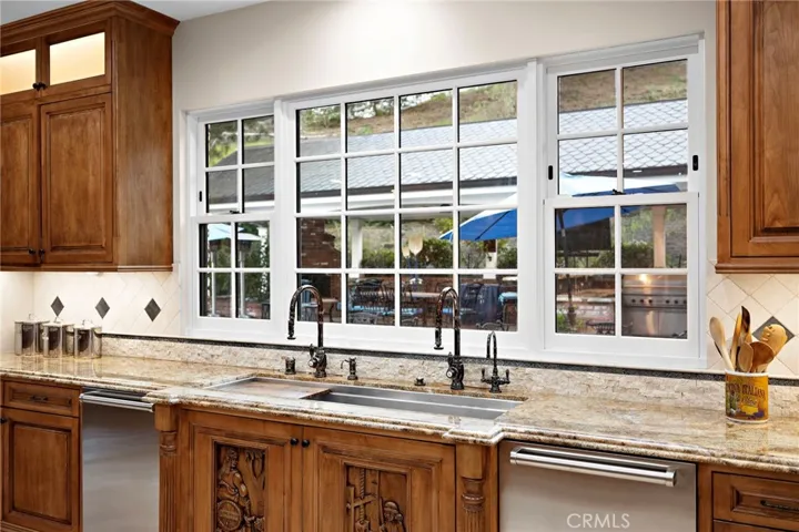 Hand Carved Wood Finishes with Luxury Sink Faucets