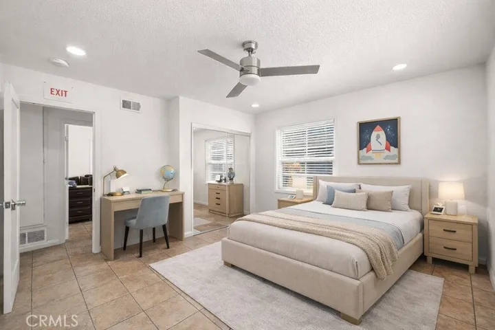 Virtually staged Mirrored closet doors in downstairs master