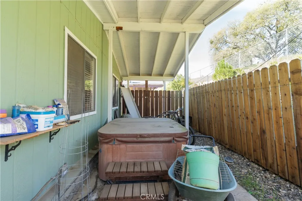 Hot tub with covered patio
