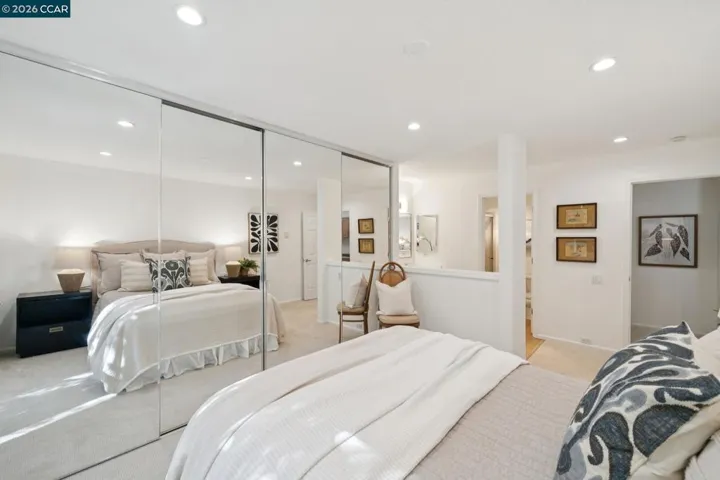 SPACIOUS CLOSETS W/MIRRORED  DOORS & CUSTOM BUILT INS