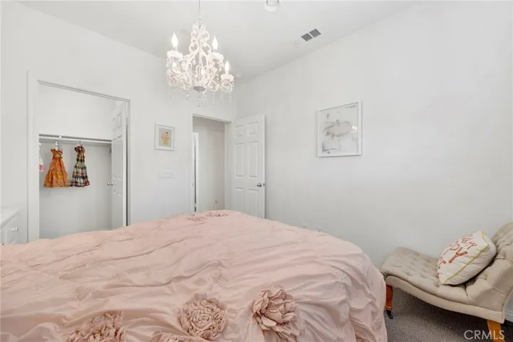 Bedroom 2 with small walk-in closet