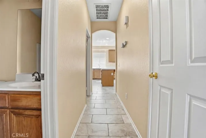 Hallway w/ large linen closet