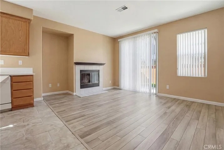 Family room w/ sliding door to backyard