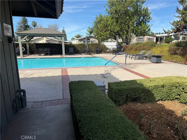 beautiful community pool, and covered patio