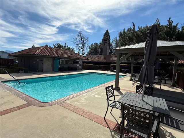 beautiful pool, shower, restrooms, covered patio