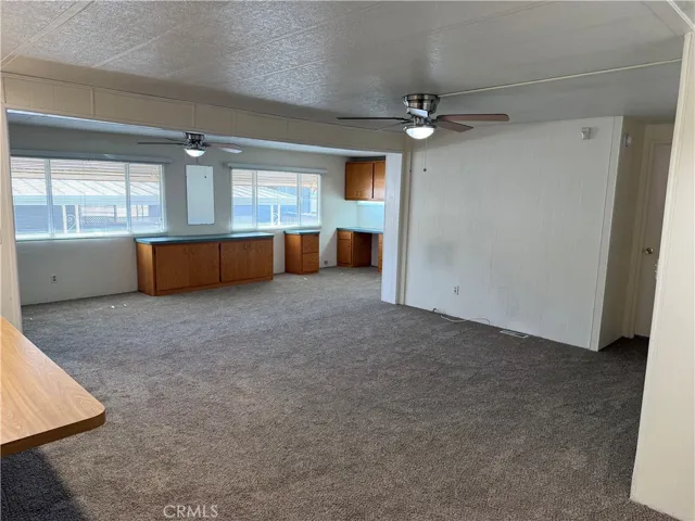 Large living room built in cabinets and desk