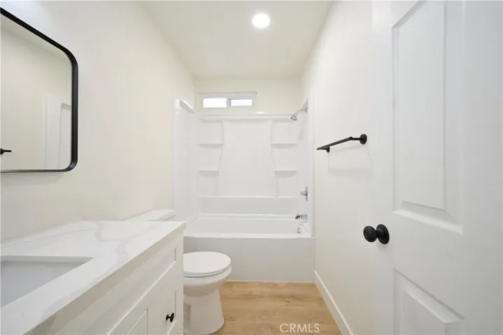 New vanity, toilet, and bathtub