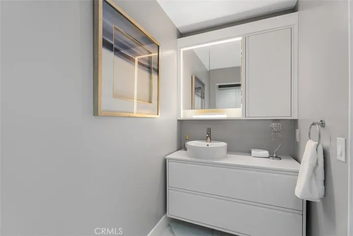 Half bathroom vanities and toilets have been redone.