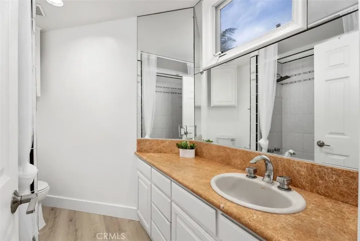 Fourth bedroom had a full bathroom with in the room for privacy with lots of cabinets and drawers.