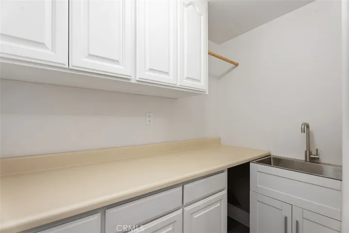Downstairs laundry room extension.
