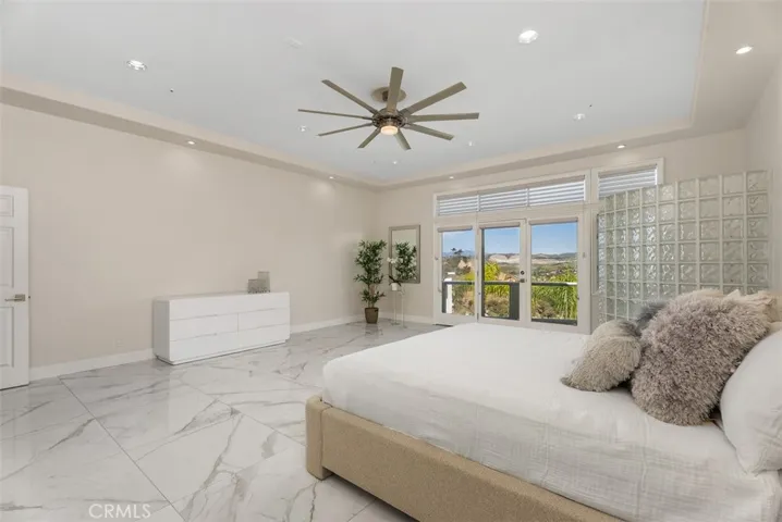 Location, Location, Location...peaceful and tranquil are the two words describing this primary bedroom, located on the main level of this property.