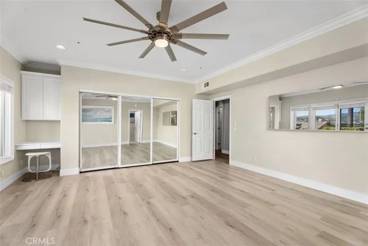 Second Bedroom with built-in desk and large closet.