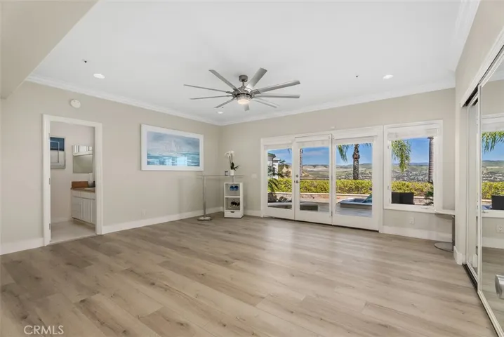 Second downstairs bedroom, is much larger, with a built-in desk, mirrored closet and it's own bathroom.