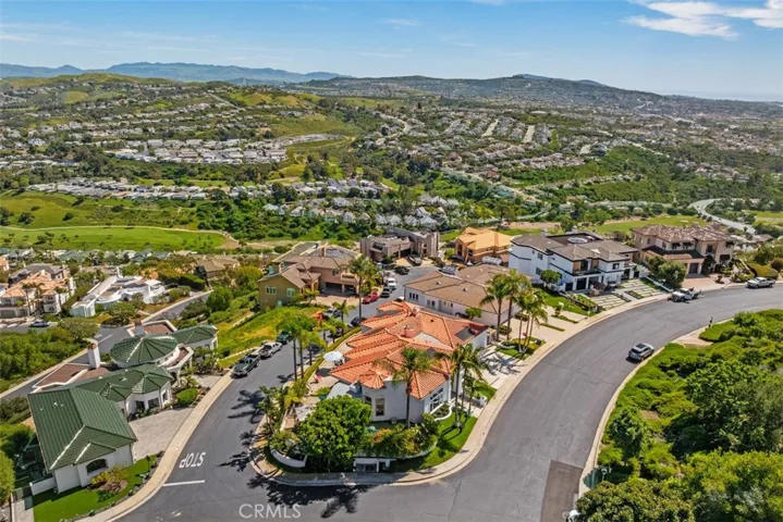 Single loaded street in the front, cul-de-sac in the back, wrap around yard with lots of views.