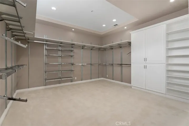 A walk-in closet like none other.  It too has trey ceiling.  The pictures do not do justice to the size of this closet.