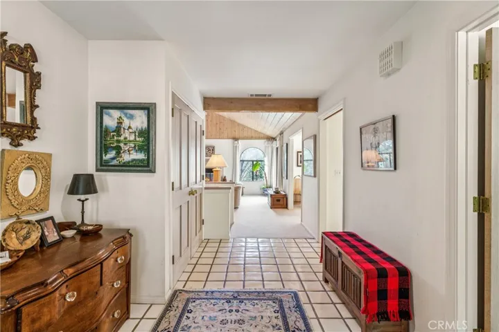 Enter to 1/2 bath n right, Coat closet on left