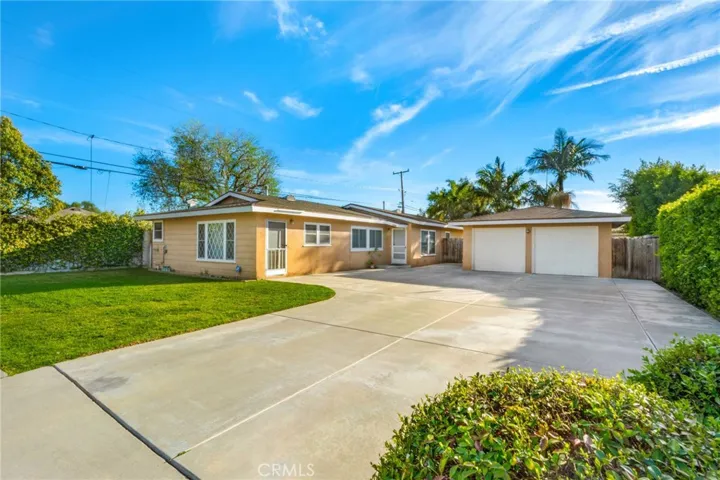 Single car garage with long driveway