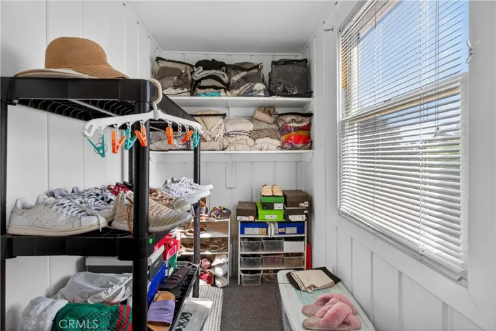 Primary walk-in could be a bright and cozy office.
