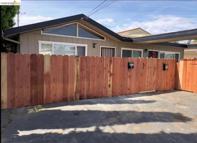View of property exterior featuring board and batten siding