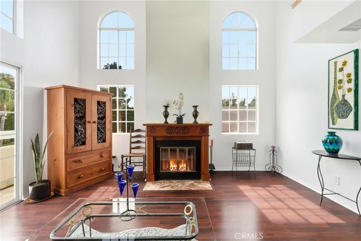 Living room with high ceilings and large windows