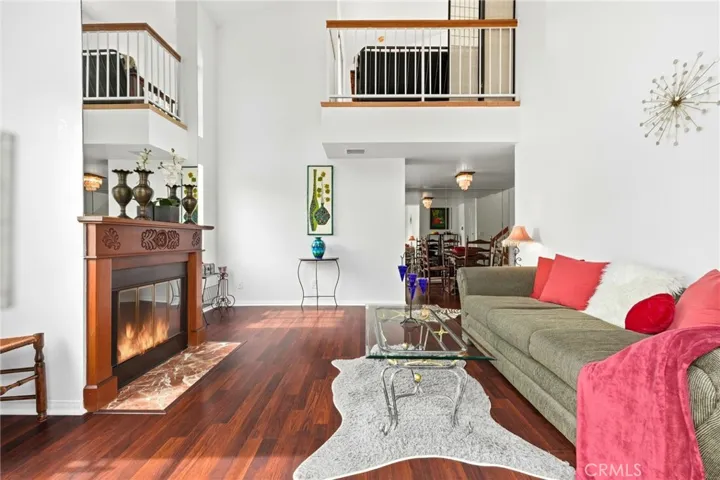 Living room with views of the kitchen and loft