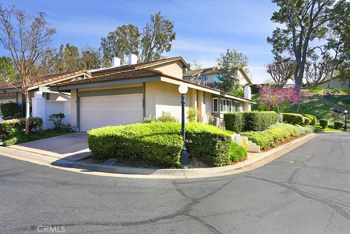 This is a SINGLE STORY, END UNIT, two-bedroom, two-car garage home in the picturesque setting of Anaheim Hills, California.