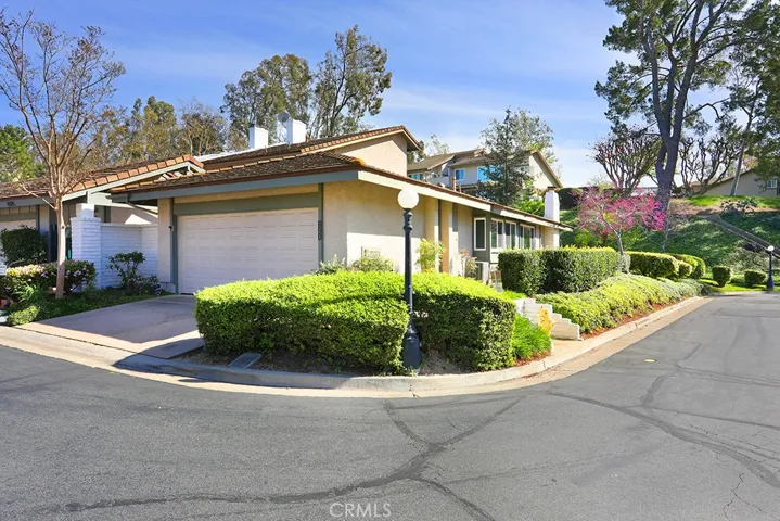 This is a SINGLE STORY, END UNIT, two-bedroom, two-car garage home in the picturesque setting of Anaheim Hills, California.