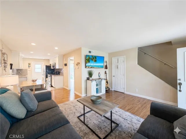 Open layout! Living/dining/kitchen and bedroom plus bathroom on first floor. Two more bedrooms upstairs.