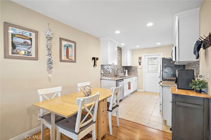 Kitchen leads out to private outdoor patio and 2-car garage