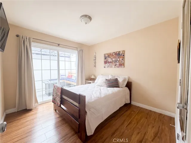 Main level bedroom with private entrance off patio. Great for roommates, guest room, office and more.