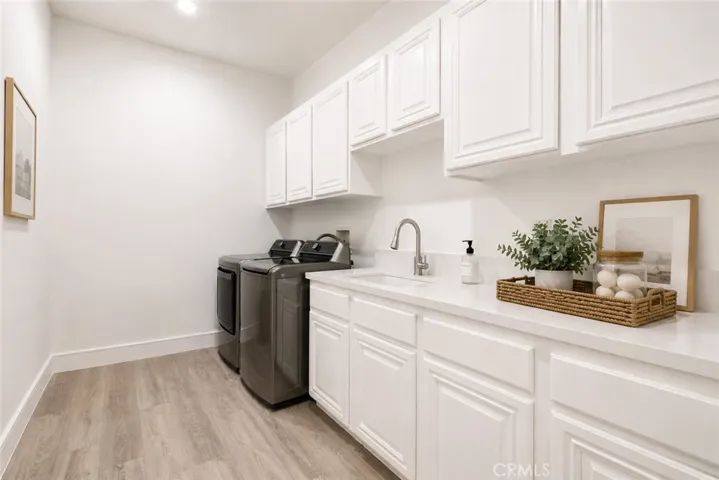 Laundry room, virtually staged