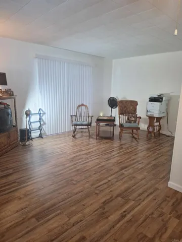 Freshly painted family room with new flooring