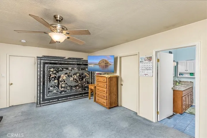 Door to the left is the entrance, door in the middle is the walk-in closet, door to the right is the primary bath.