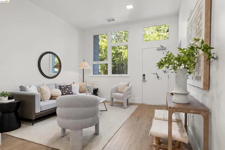 Living room featuring wood finished floors and baseboards