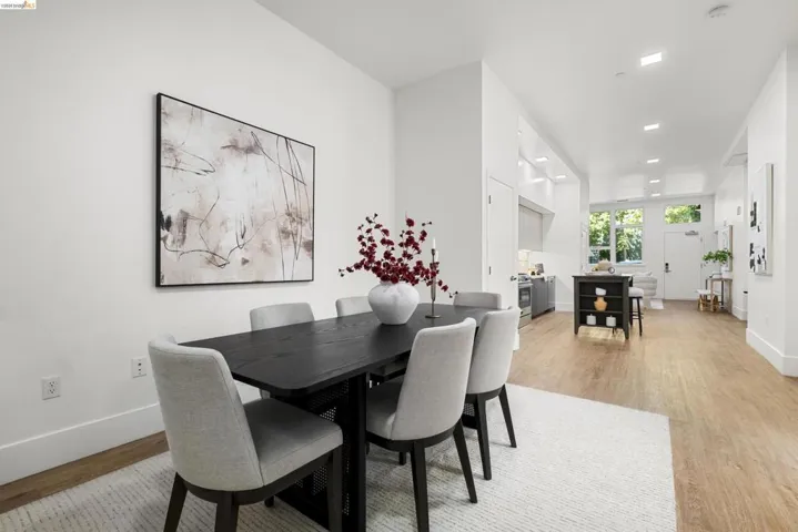 Dining space featuring light wood-style flooring and recessed lighting