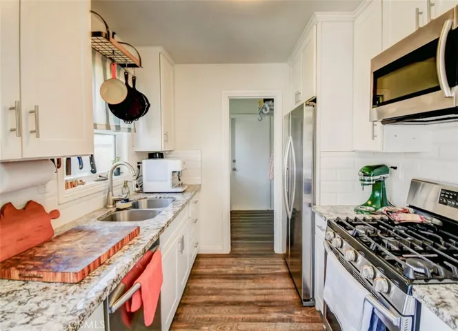 Kitchen facing laundry room