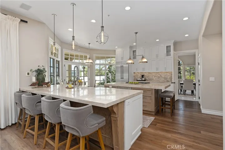 Remodeled Kitchen in white cabinetry and french oak wood
