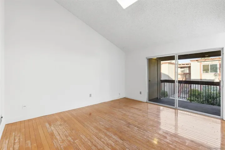 A vaulted ceiling with a sunlight offers this condo a spacious and bright ambiance.  This sunny space is even more amplified with the sliding glass doors to the adjacent patio.  This particular floor plan lends it self to entertaining comfortably.