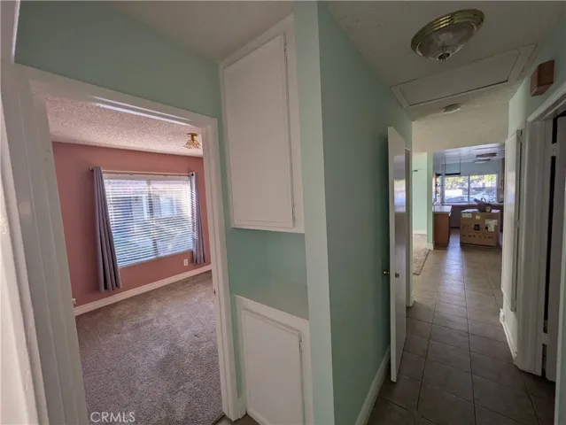 Hallway View of Bedroom 2, Right leads to Living Room & Kitchen