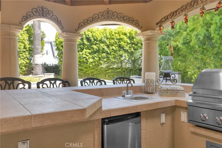 Host unforgettable nights under the stars in this one-of-a-kind outdoor living space.