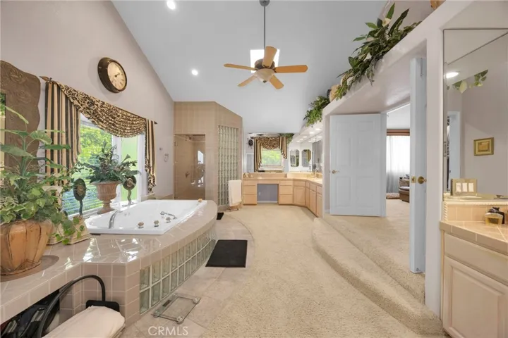 Designed for serenity—elevated finishes, a jet soaking tub, and a space that invites you to slow down.