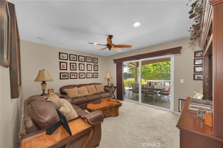 Main floor Bedroom with ensuite bath and entrance to backyard (currently being used as a den)