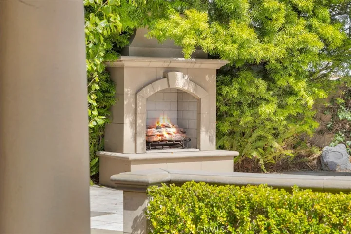 From summer pool days to cozy by the fire nights—this backyard does it all.