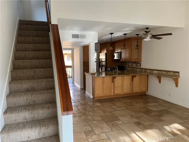 stairs lead to large loft can be used for office