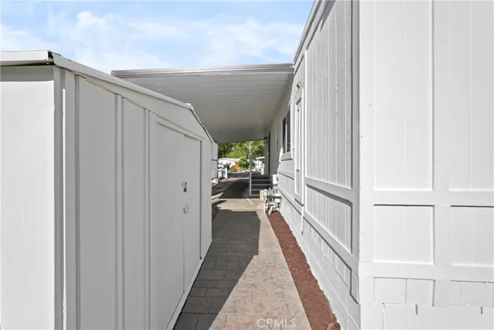 Shed on the carport side of the home